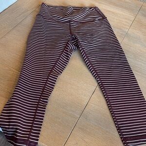 Striped women’s lululemon size 8 Capri legging burgundy and white stripe